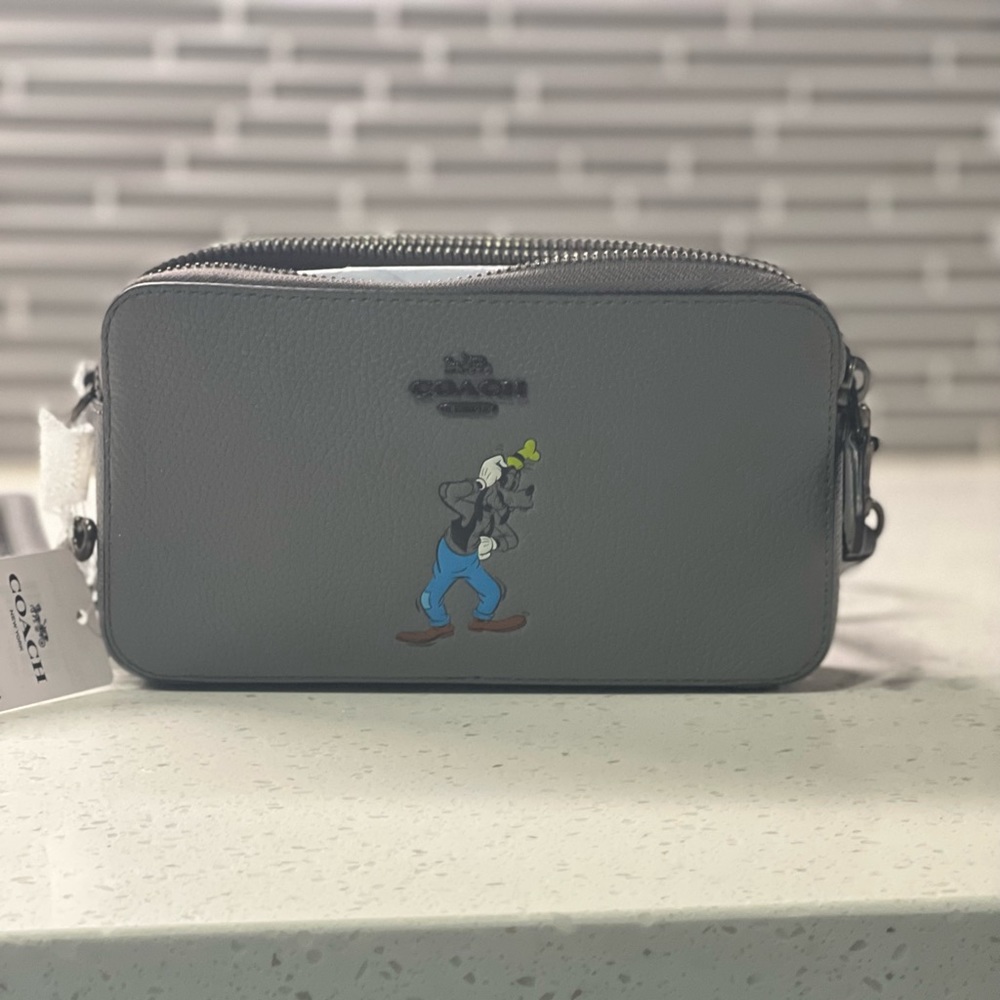 Coach Disney Goofy cross body Kira bag